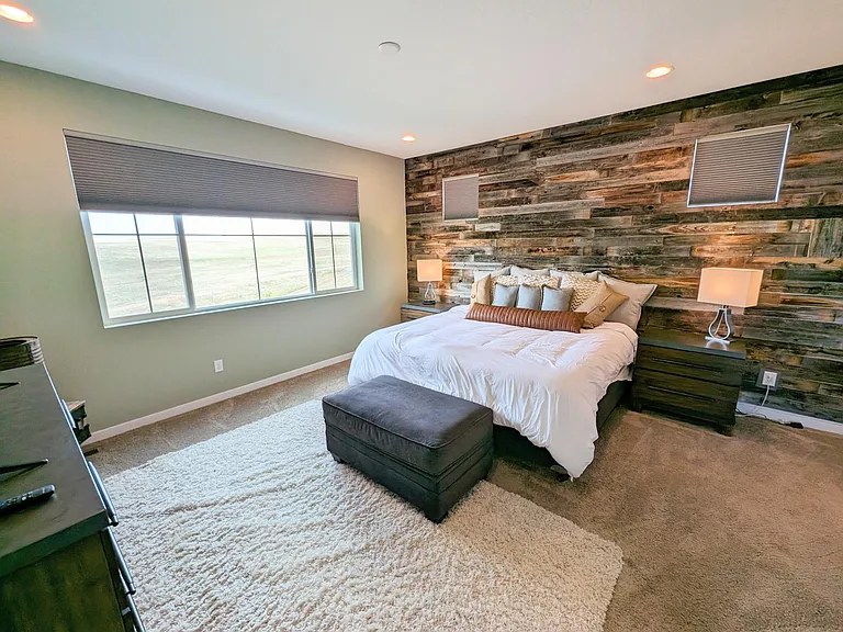 Master bedroom: barn-wood accent wall & king Purple mattress