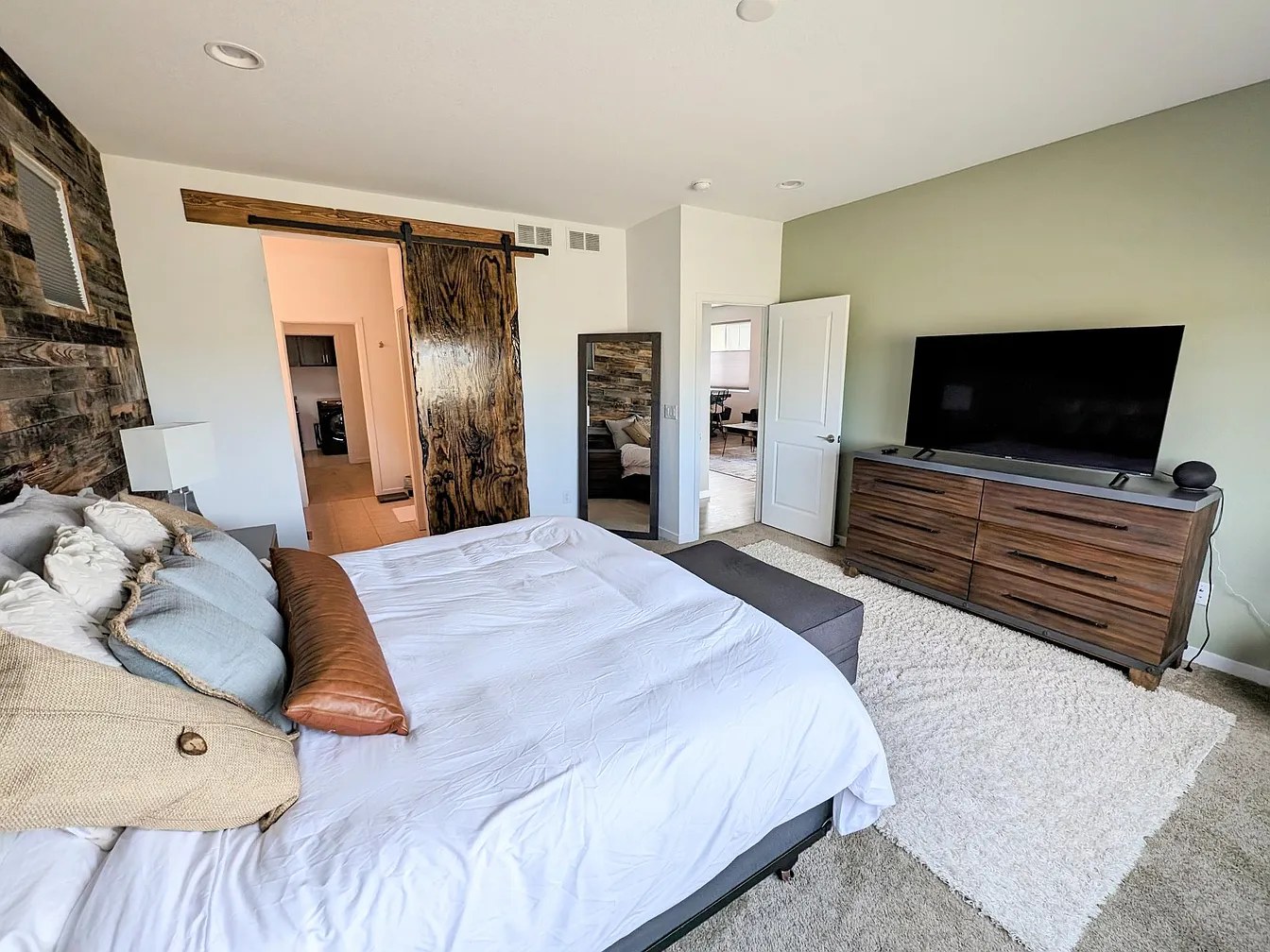 Master suite with sliding barn door