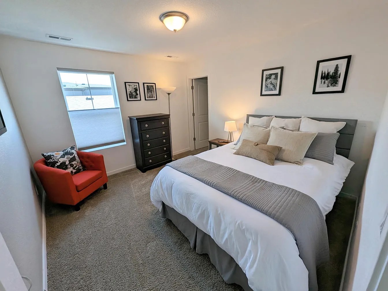 Bedroom 2: queen bed & reading chair